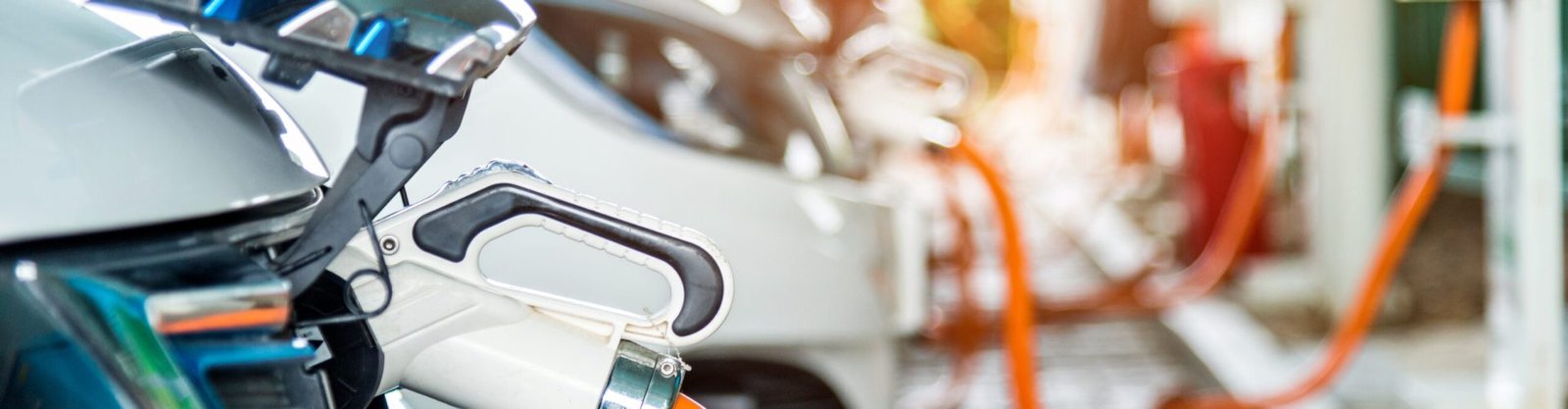 Electric cars are charging in station.
